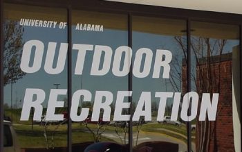 A Sign In Front Of A Building