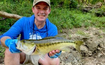 A Man Holding A Fish