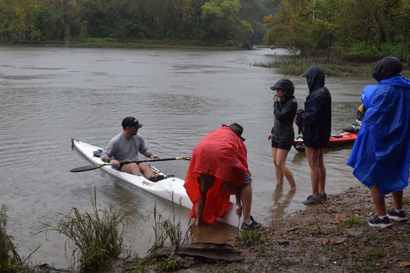 Kayaker setting off in the rain