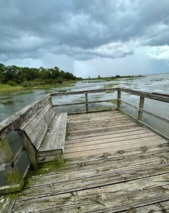 Pier Overlooking A Body Of Water