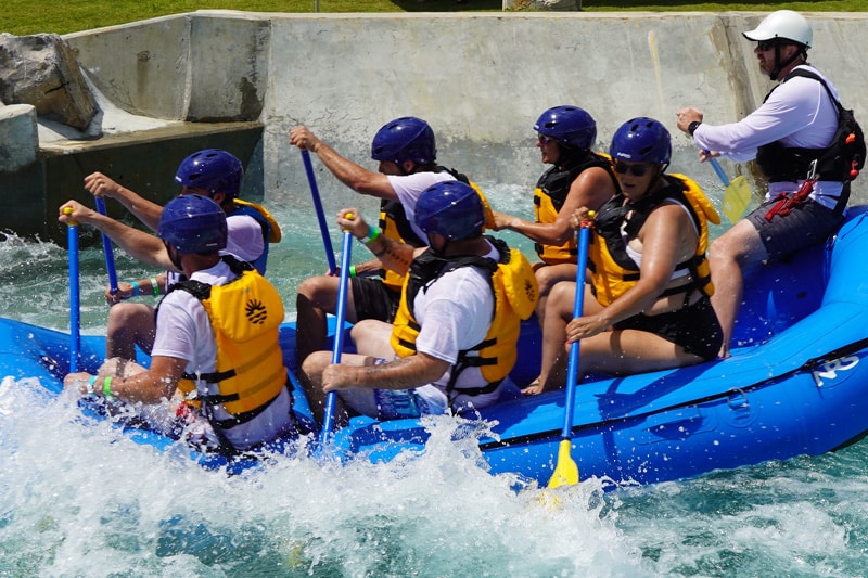 a group of people on a raft