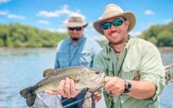 A Person Holding A Fish