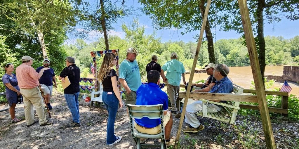 A Group Of People Having A Picnic