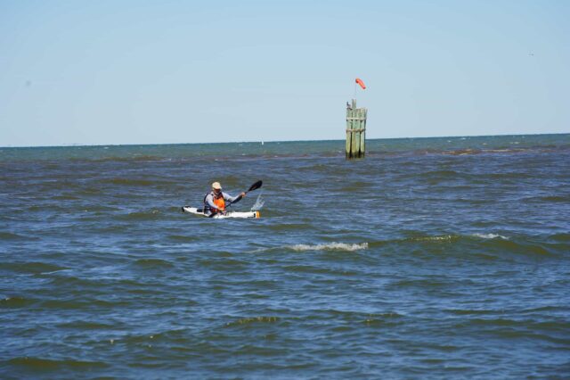 Man Kayaking In The Ocean