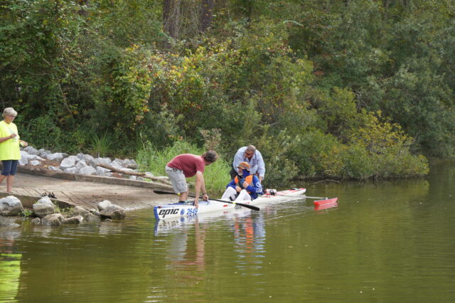 A Man Setting Off In His Kayak