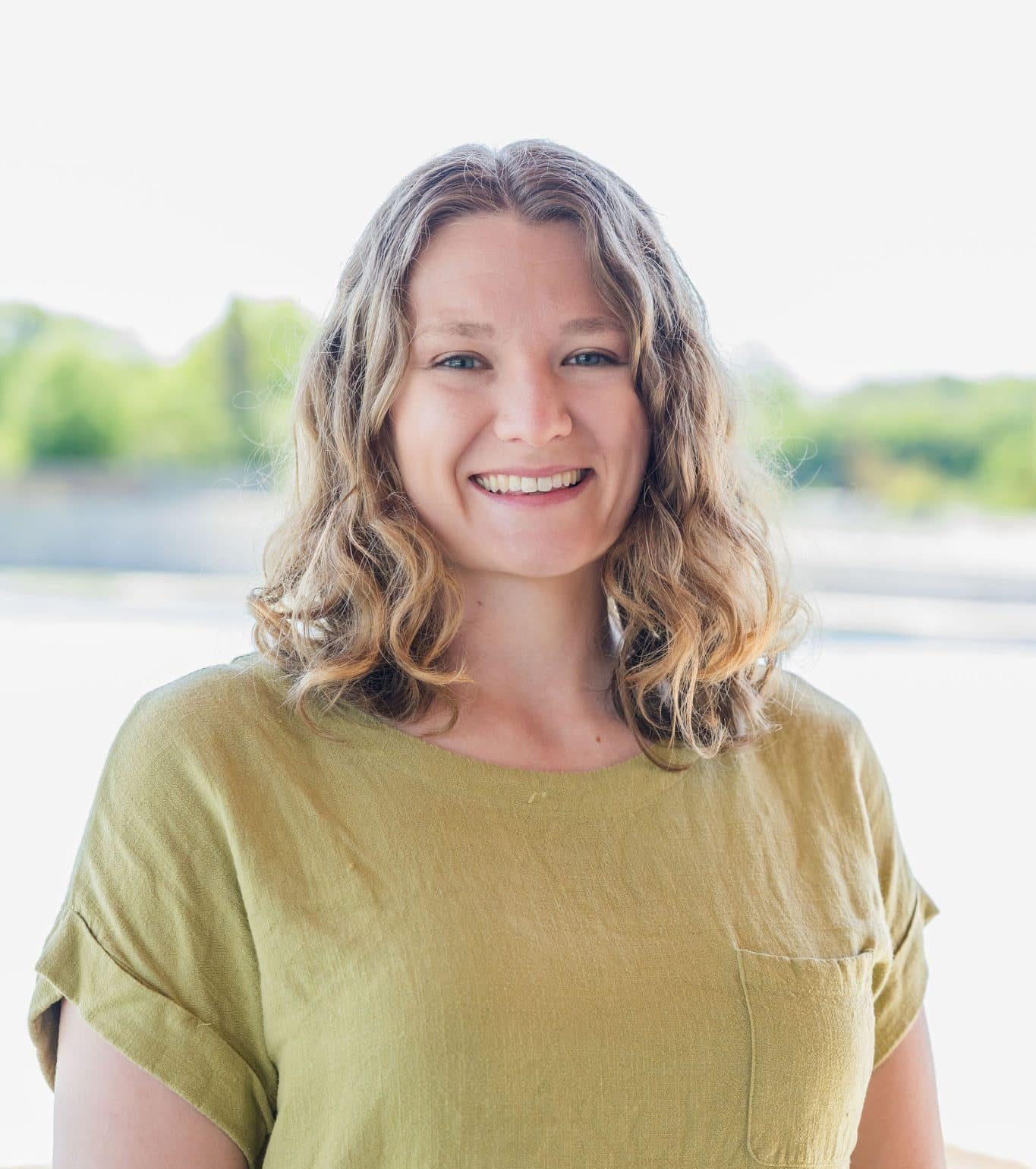 a woman smiling for the camera