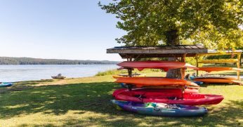 kayaks stacked together
